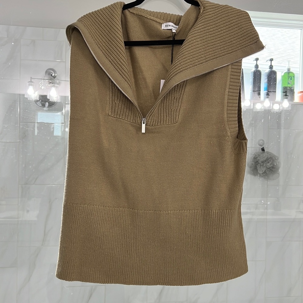 We wore what half zip sweater vest